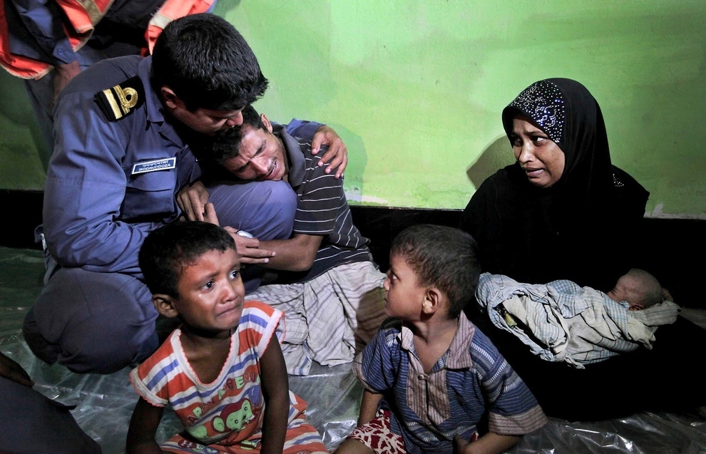 Rohingya refugee family beg the Bangladeshi coast guard to not deport them